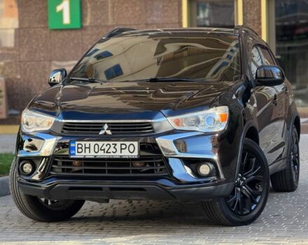 Черный Мицубиси Аутлендер, объемом двигателя 2.4 л и пробегом 130 тыс. км за 13900 $, фото 1 на Automoto.ua