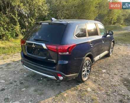 Черный Мицубиси Аутлендер, объемом двигателя 2.4 л и пробегом 221 тыс. км за 11900 $, фото 3 на Automoto.ua