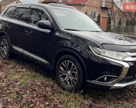 Чорний Міцубісі Аутлендер, об'ємом двигуна 2.36 л та пробігом 110 тис. км за 17500 $, фото 2 на Automoto.ua