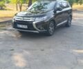 Черный Мицубиси Аутлендер, объемом двигателя 2.4 л и пробегом 156 тыс. км за 330 $, фото 3 на Automoto.ua