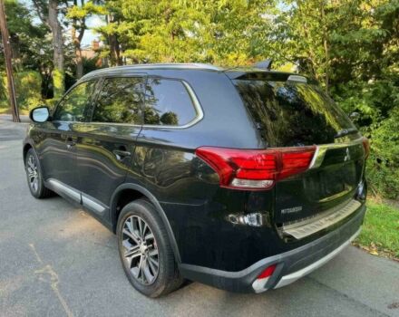 Черный Мицубиси Аутлендер, объемом двигателя 2.4 л и пробегом 66 тыс. км за 10650 $, фото 4 на Automoto.ua