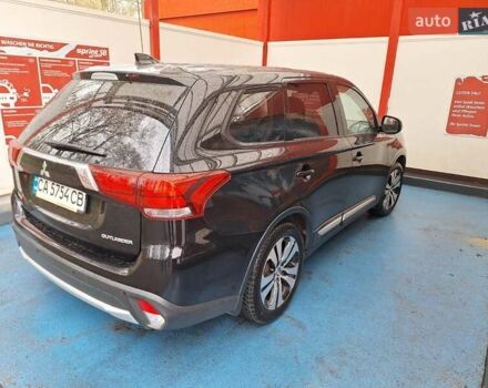 Чорний Міцубісі Аутлендер, об'ємом двигуна 2 л та пробігом 114 тис. км за 17600 $, фото 4 на Automoto.ua