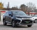Чорний Міцубісі Аутлендер, об'ємом двигуна 2.4 л та пробігом 154 тис. км за 13499 $, фото 1 на Automoto.ua