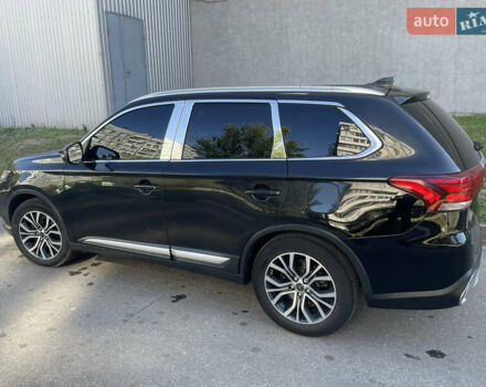 Чорний Міцубісі Аутлендер, об'ємом двигуна 2.36 л та пробігом 150 тис. км за 13500 $, фото 2 на Automoto.ua