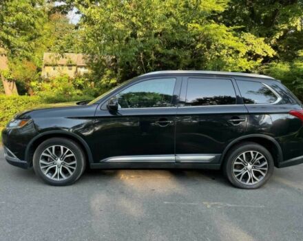 Черный Мицубиси Аутлендер, объемом двигателя 2.4 л и пробегом 66 тыс. км за 10650 $, фото 3 на Automoto.ua