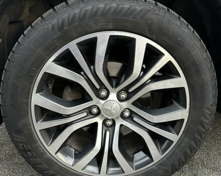 Черный Мицубиси Аутлендер, объемом двигателя 2.36 л и пробегом 128 тыс. км за 15500 $, фото 7 на Automoto.ua