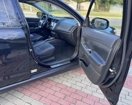 Чорний Міцубісі Аутлендер, об'ємом двигуна 2.4 л та пробігом 111 тис. км за 13999 $, фото 9 на Automoto.ua