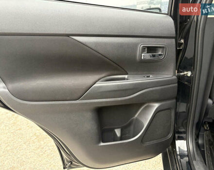 Чорний Міцубісі Аутлендер, об'ємом двигуна 2.4 л та пробігом 110 тис. км за 17290 $, фото 37 на Automoto.ua