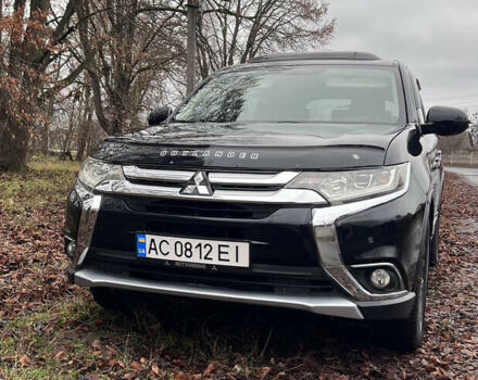 Чорний Міцубісі Аутлендер, об'ємом двигуна 2.36 л та пробігом 110 тис. км за 17500 $, фото 1 на Automoto.ua
