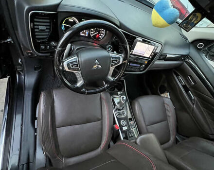 Чорний Міцубісі Аутлендер, об'ємом двигуна 2 л та пробігом 155 тис. км за 22500 $, фото 11 на Automoto.ua