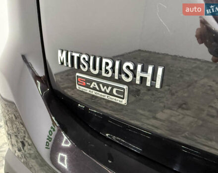 Чорний Міцубісі Аутлендер, об'ємом двигуна 2 л та пробігом 67 тис. км за 22999 $, фото 31 на Automoto.ua