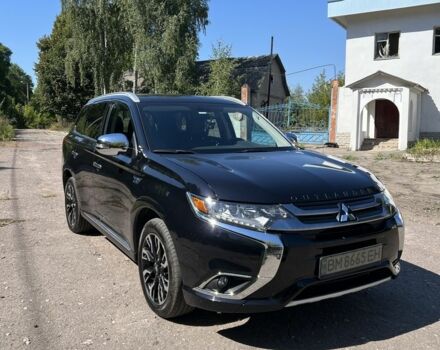 Черный Мицубиси Аутлендер, объемом двигателя 2 л и пробегом 54 тыс. км за 20800 $, фото 1 на Automoto.ua