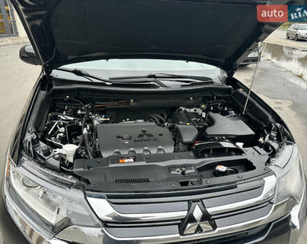 Чорний Міцубісі Аутлендер, об'ємом двигуна 2.36 л та пробігом 169 тис. км за 13450 $, фото 31 на Automoto.ua