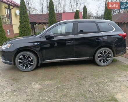 Чорний Міцубісі Аутлендер, об'ємом двигуна 2 л та пробігом 96 тис. км за 22000 $, фото 4 на Automoto.ua