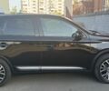 Черный Мицубиси Аутлендер, объемом двигателя 2.4 л и пробегом 149 тыс. км за 17100 $, фото 1 на Automoto.ua