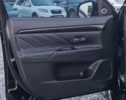 Черный Мицубиси Аутлендер, объемом двигателя 2 л и пробегом 115 тыс. км за 23700 $, фото 17 на Automoto.ua