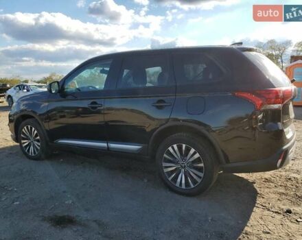 Чорний Міцубісі Аутлендер, об'ємом двигуна 2.4 л та пробігом 153 тис. км за 2800 $, фото 1 на Automoto.ua