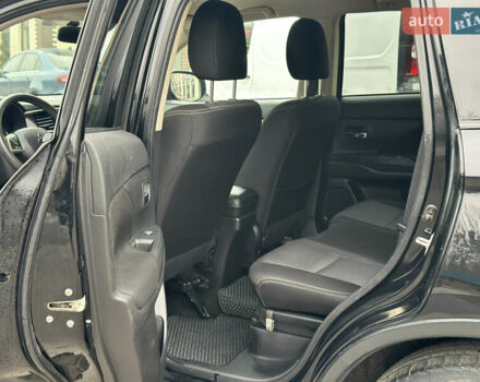 Чорний Міцубісі Аутлендер, об'ємом двигуна 2.36 л та пробігом 169 тис. км за 13450 $, фото 14 на Automoto.ua