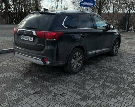 Черный Мицубиси Аутлендер, объемом двигателя 2.36 л и пробегом 91 тыс. км за 18300 $, фото 4 на Automoto.ua