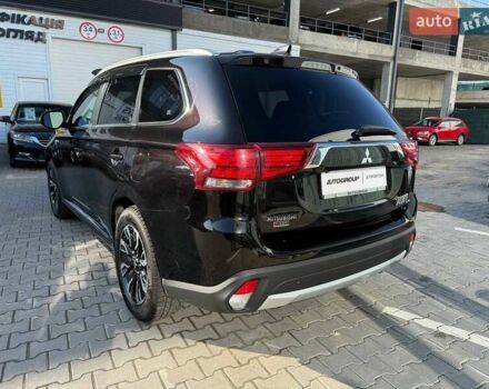 Черный Мицубиси Аутлендер, объемом двигателя 2 л и пробегом 67 тыс. км за 23000 $, фото 2 на Automoto.ua