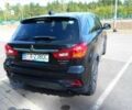 Черный Мицубиси Аутлендер, объемом двигателя 2 л и пробегом 74 тыс. км за 9600 $, фото 2 на Automoto.ua