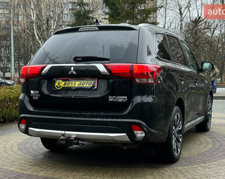 Черный Мицубиси Аутлендер, объемом двигателя 2 л и пробегом 96 тыс. км за 22750 $, фото 6 на Automoto.ua