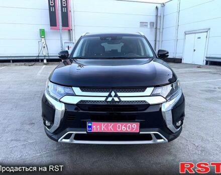 Черный Мицубиси Аутлендер, объемом двигателя 3 л и пробегом 115 тыс. км за 18200 $, фото 5 на Automoto.ua