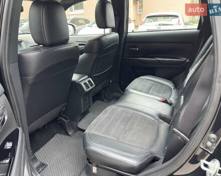 Чорний Міцубісі Аутлендер, об'ємом двигуна 2.36 л та пробігом 153 тис. км за 16450 $, фото 11 на Automoto.ua