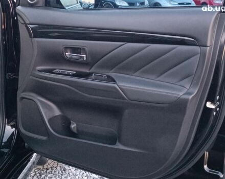 Черный Мицубиси Аутлендер, объемом двигателя 2 л и пробегом 115 тыс. км за 23700 $, фото 31 на Automoto.ua