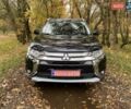 Чорний Міцубісі Аутлендер, об'ємом двигуна 2 л та пробігом 75 тис. км за 22100 $, фото 1 на Automoto.ua