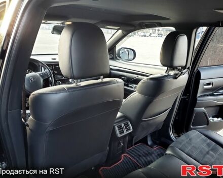 Черный Мицубиси Аутлендер, объемом двигателя 2.4 л и пробегом 130 тыс. км за 16499 $, фото 7 на Automoto.ua