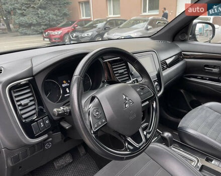 Чорний Міцубісі Аутлендер, об'ємом двигуна 2.36 л та пробігом 153 тис. км за 16450 $, фото 13 на Automoto.ua