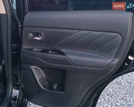 Чорний Міцубісі Аутлендер, об'ємом двигуна 2 л та пробігом 115 тис. км за 23700 $, фото 33 на Automoto.ua