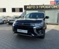Черный Мицубиси Аутлендер, объемом двигателя 2 л и пробегом 67 тыс. км за 23000 $, фото 1 на Automoto.ua