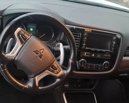 Черный Мицубиси Аутлендер, объемом двигателя 2 л и пробегом 65 тыс. км за 13200 $, фото 6 на Automoto.ua