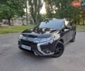 Чорний Міцубісі Аутлендер, об'ємом двигуна 2.4 л та пробігом 140 тис. км за 14800 $, фото 1 на Automoto.ua