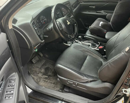 Чорний Міцубісі Аутлендер, об'ємом двигуна 2.4 л та пробігом 180 тис. км за 15500 $, фото 2 на Automoto.ua