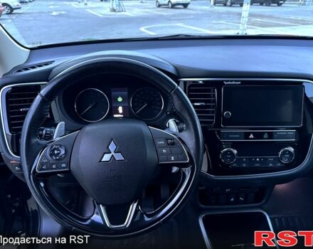 Черный Мицубиси Аутлендер, объемом двигателя 3 л и пробегом 115 тыс. км за 18200 $, фото 8 на Automoto.ua