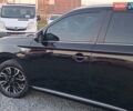 Чорний Міцубісі Аутлендер, об'ємом двигуна 2 л та пробігом 115 тис. км за 23700 $, фото 3 на Automoto.ua