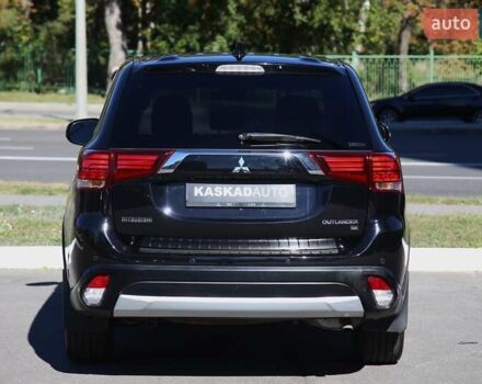 Черный Мицубиси Аутлендер, объемом двигателя 2.4 л и пробегом 130 тыс. км за 16200 $, фото 4 на Automoto.ua