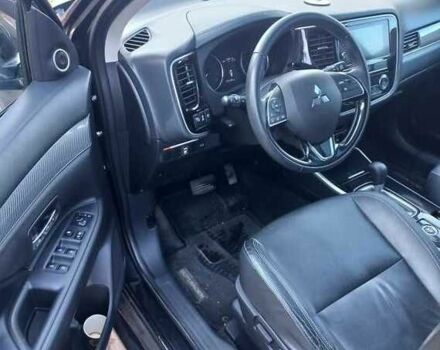 Черный Мицубиси Аутлендер, объемом двигателя 2.4 л и пробегом 132 тыс. км за 17600 $, фото 3 на Automoto.ua