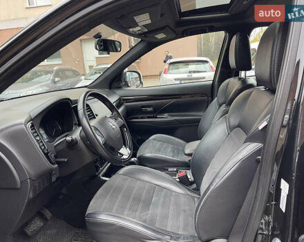 Чорний Міцубісі Аутлендер, об'ємом двигуна 2.36 л та пробігом 153 тис. км за 16450 $, фото 12 на Automoto.ua