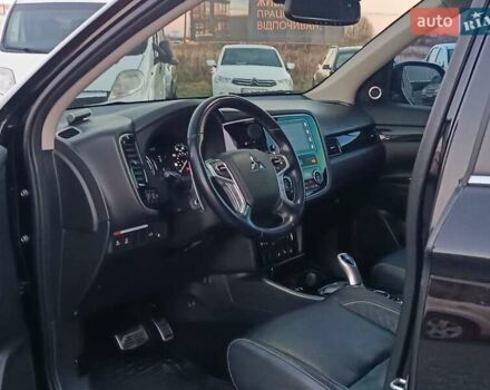 Чорний Міцубісі Аутлендер, об'ємом двигуна 2 л та пробігом 115 тис. км за 23700 $, фото 19 на Automoto.ua