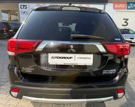 Черный Мицубиси Аутлендер, объемом двигателя 2 л и пробегом 67 тыс. км за 23000 $, фото 3 на Automoto.ua