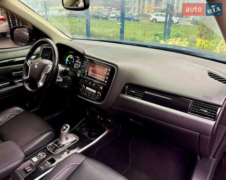 Чорний Міцубісі Аутлендер, об'ємом двигуна 2 л та пробігом 79 тис. км за 22900 $, фото 42 на Automoto.ua