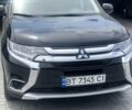 Черный Мицубиси Аутлендер, объемом двигателя 2.4 л и пробегом 45 тыс. км за 17000 $, фото 1 на Automoto.ua