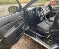 Чорний Міцубісі Аутлендер, об'ємом двигуна 2 л та пробігом 75 тис. км за 22100 $, фото 13 на Automoto.ua