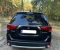 Черный Мицубиси Аутлендер, объемом двигателя 2.4 л и пробегом 105 тыс. км за 3000 $, фото 5 на Automoto.ua