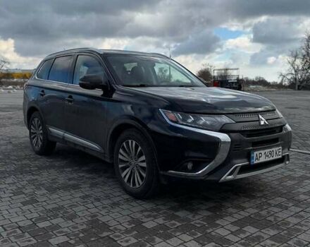 Черный Мицубиси Аутлендер, объемом двигателя 2.36 л и пробегом 91 тыс. км за 18300 $, фото 2 на Automoto.ua
