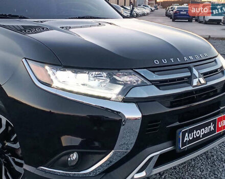 Чорний Міцубісі Аутлендер, об'ємом двигуна 2 л та пробігом 115 тис. км за 23700 $, фото 13 на Automoto.ua